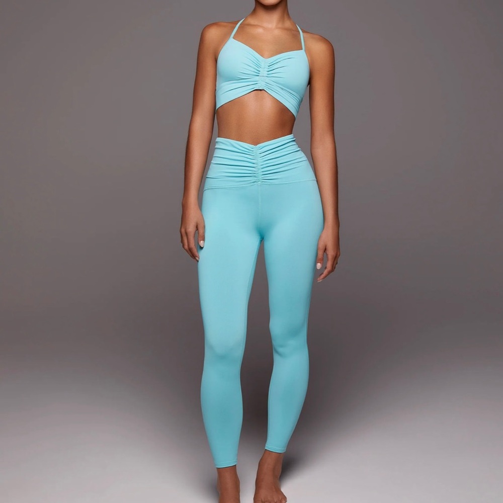 MICHI PALMA LEGGINGS  BNWT size: Large Island Blue set w/longline bra MSRP$138